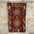 Red 2' x 4' vintage kilim rug with traditional design, handmade in Turkey – Cru.