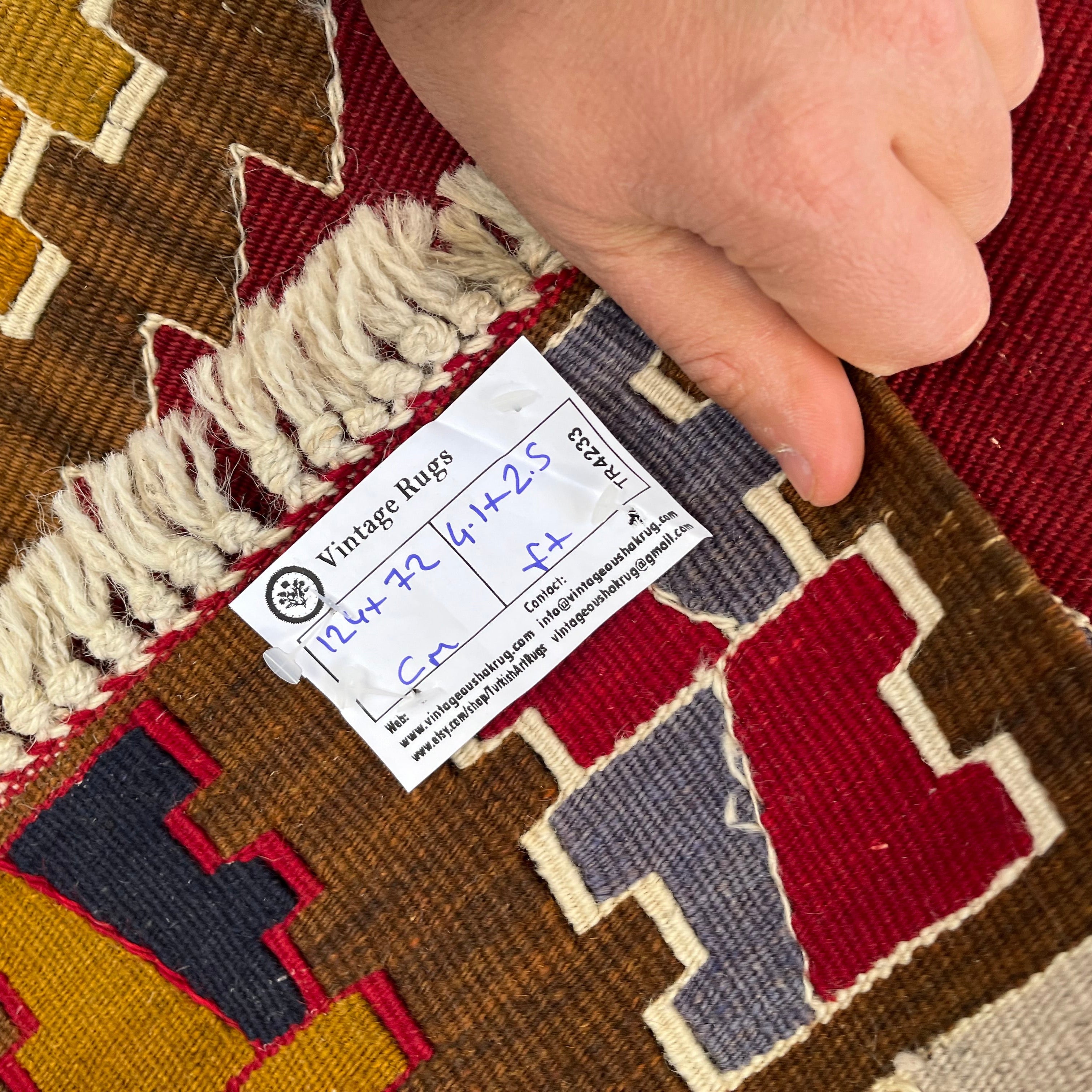 1970s red vintage Turkish kilim rug with traditional design, flatweave construction and low pile.