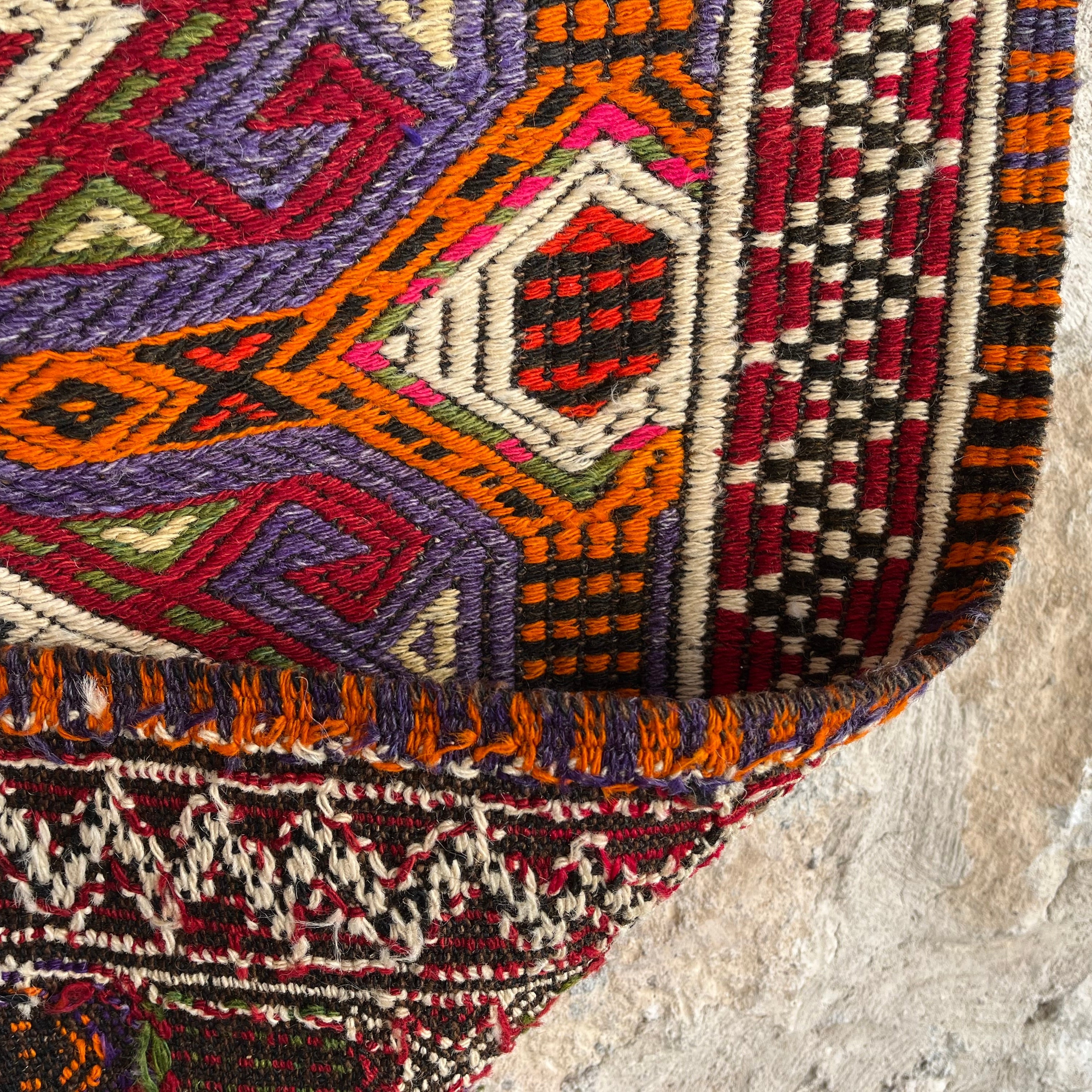 1970s red vintage Turkish kilim rug with traditional design, flatweave construction and low pile.