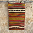 Red 2' x 4' vintage kilim rug with striped design, handmade in Turkey – Raven.