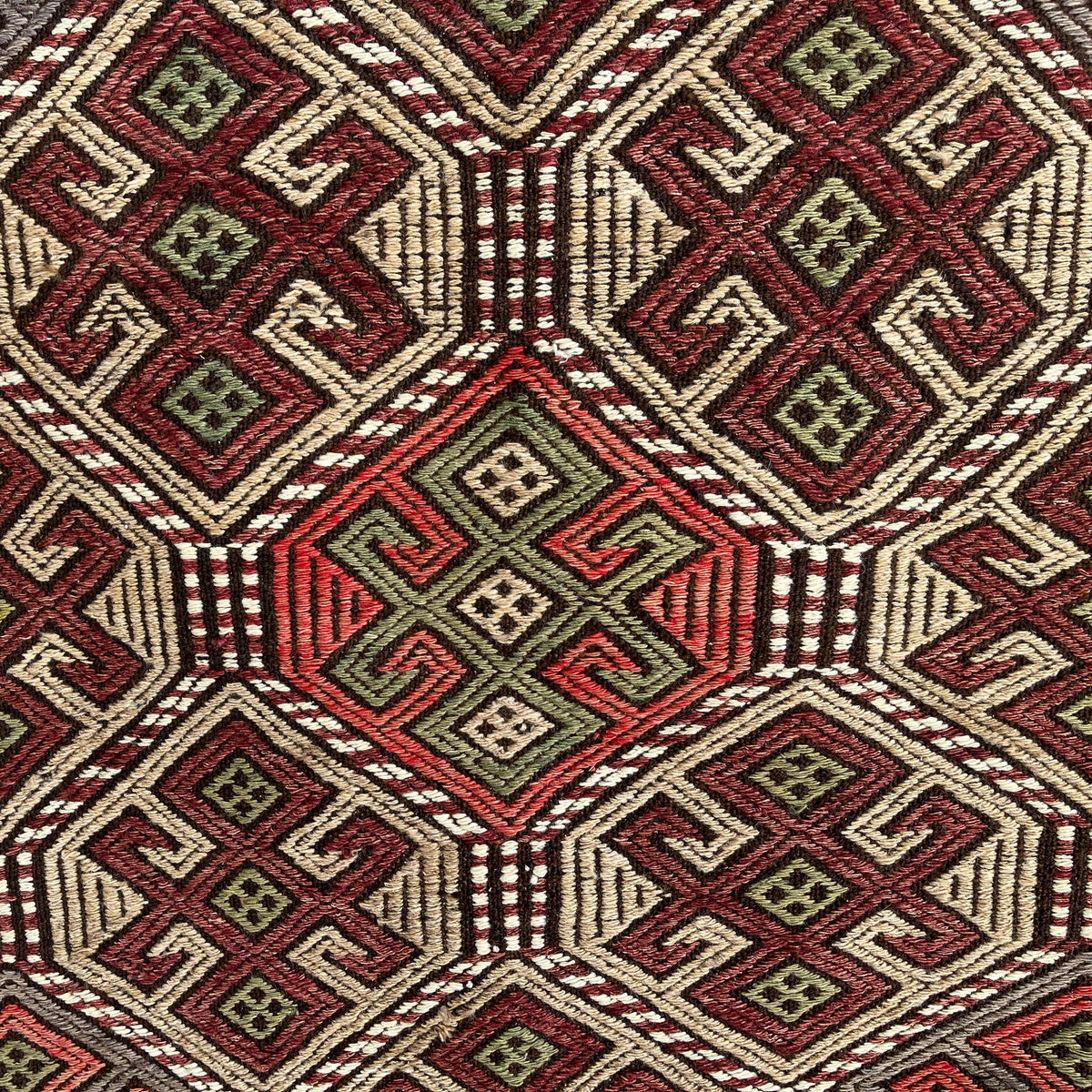 Brown 3' x 4' vintage Turkish kilim rug in wool and cotton, shown on the floor.