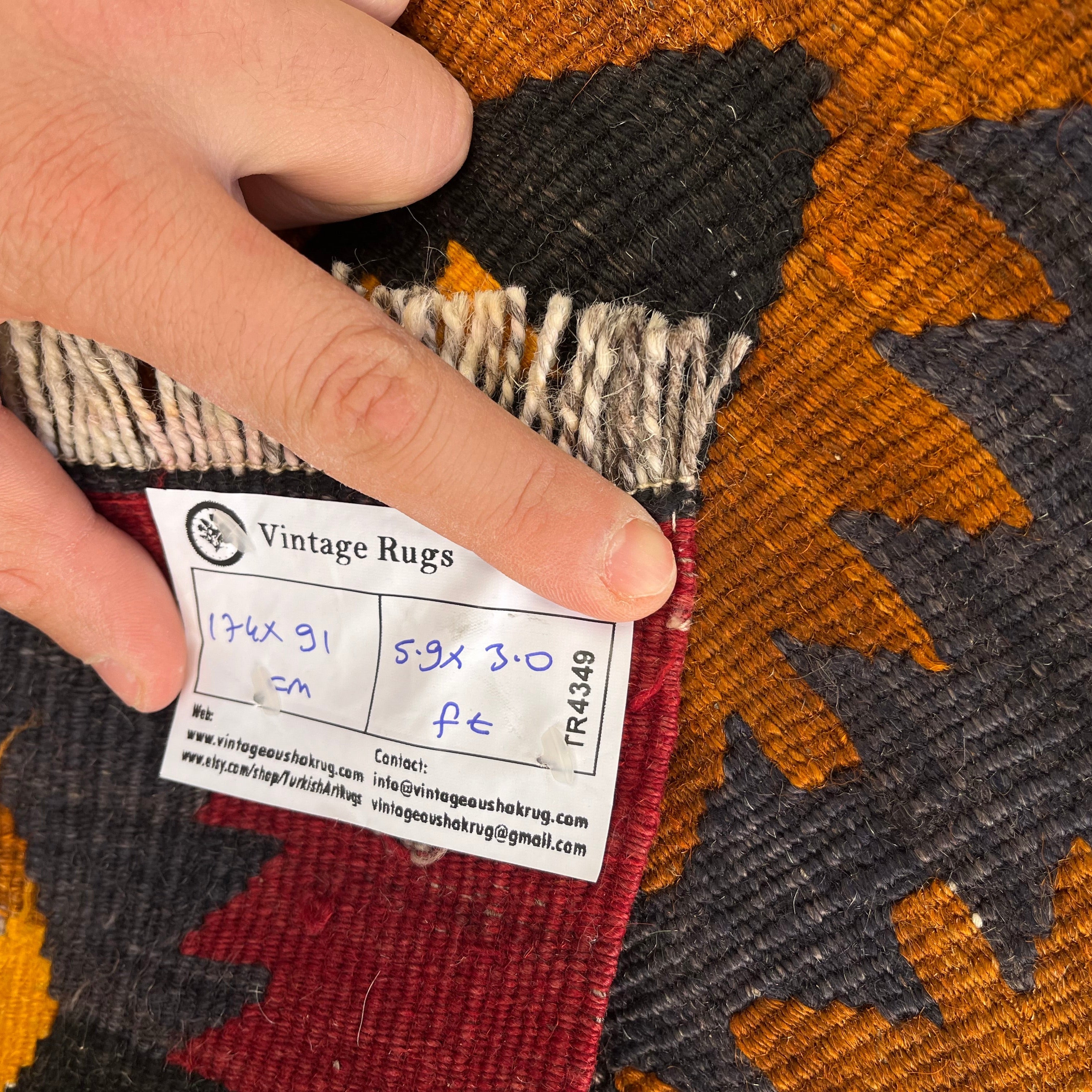 1970s red vintage Turkish kilim rug with traditional design, flatweave construction and low pile.