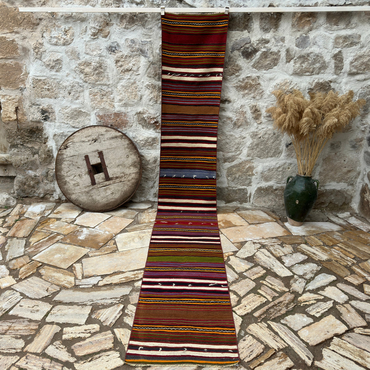 Red 2' x 13' vintage kilim runner rug with striped design, handmade in Turkey – Marley.