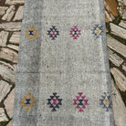 1970s gray vintage Turkish kilim runner rug with traditional design, hand-knotted weave and low pile.