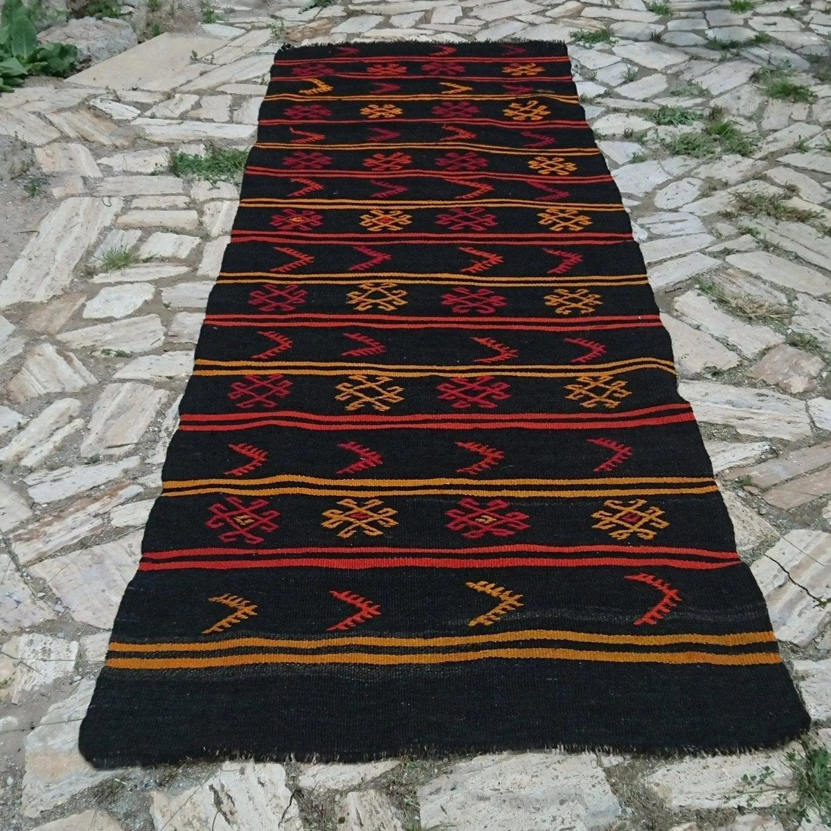 Black 3' x 11' vintage kilim runner rug with traditional design, handmade in Turkey – Annalee.