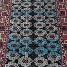 1970s blue vintage Turkish konya rug with geometric design, hand-knotted weave and low pile.