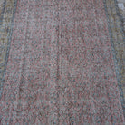 1970s pink vintage Turkish large floral rug with floral design, hand-knotted weave and low pile.
