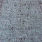 1970s green vintage Turkish large floral rug with floral design, hand-knotted weave and low pile.