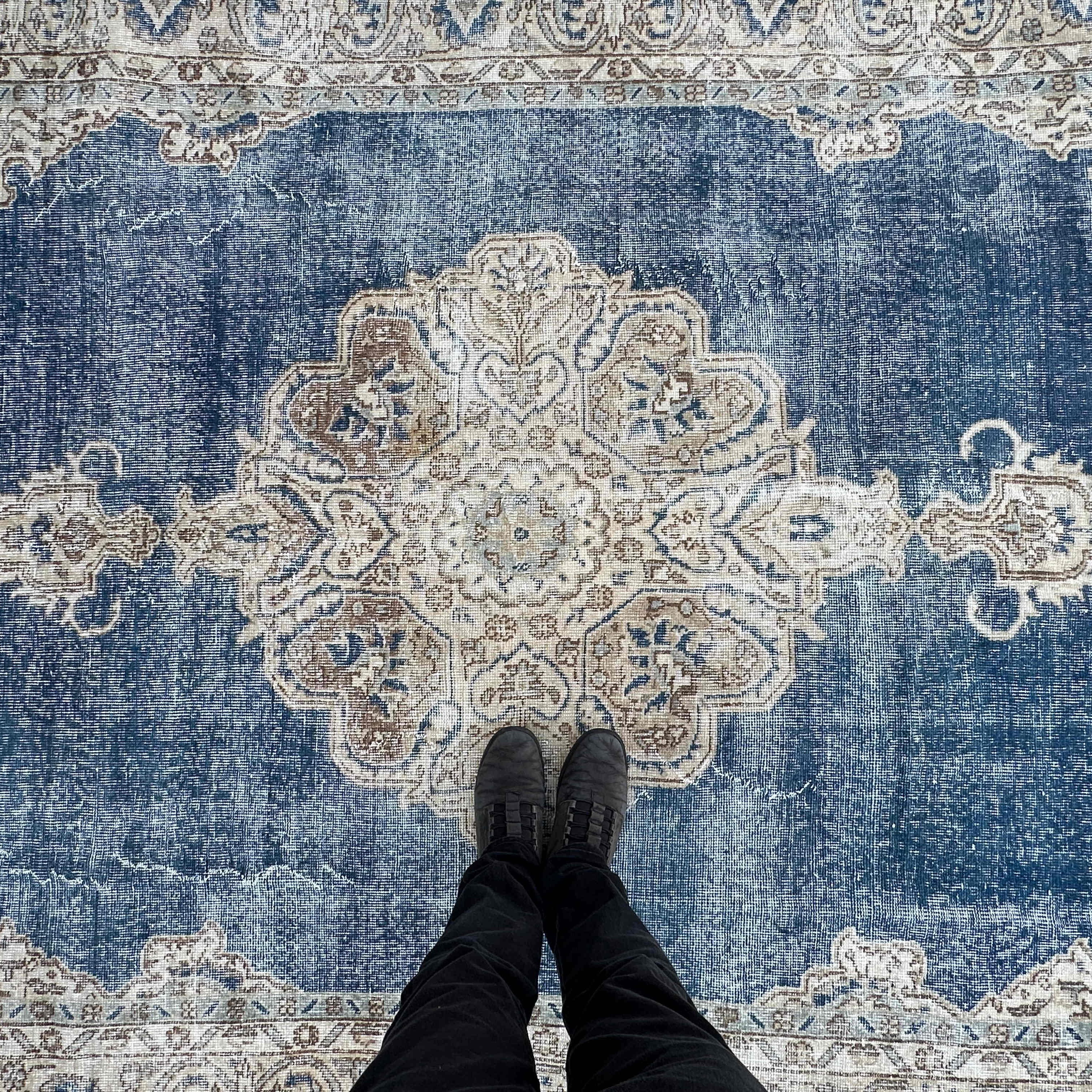 1970s blue vintage Turkish large rug with medallion design, hand-knotted weave and low pile.