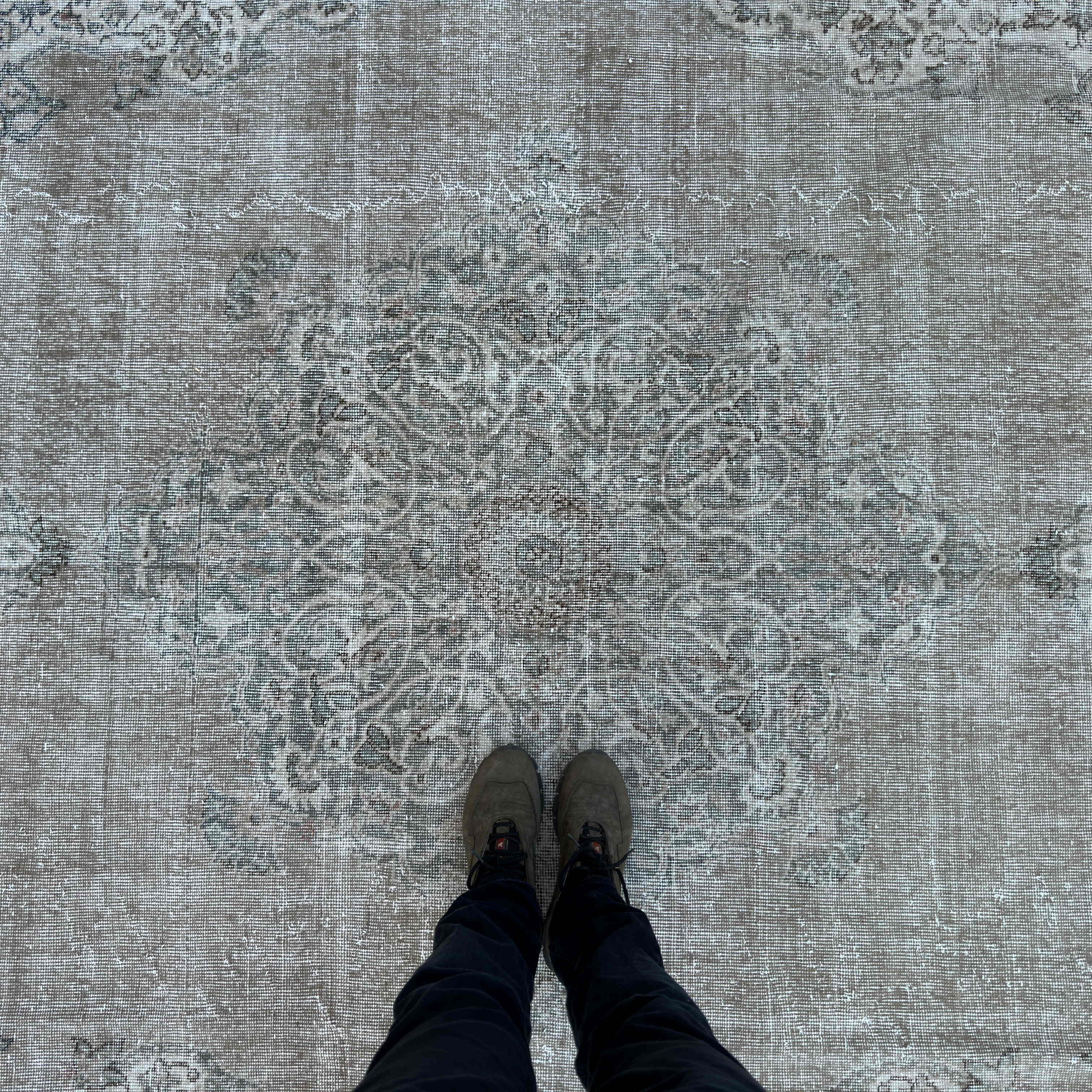 1970s brown vintage Turkish large rug with medallion design, hand-knotted weave and low pile.