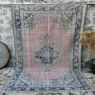 Pale Pink 7' x 10' vintage medallion carpet with medallion design, handmade in Turkey – Aairah.