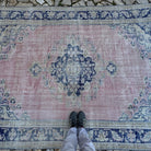 1970s pale pink vintage Turkish medallion carpet with medallion design, hand-knotted weave and low pile.