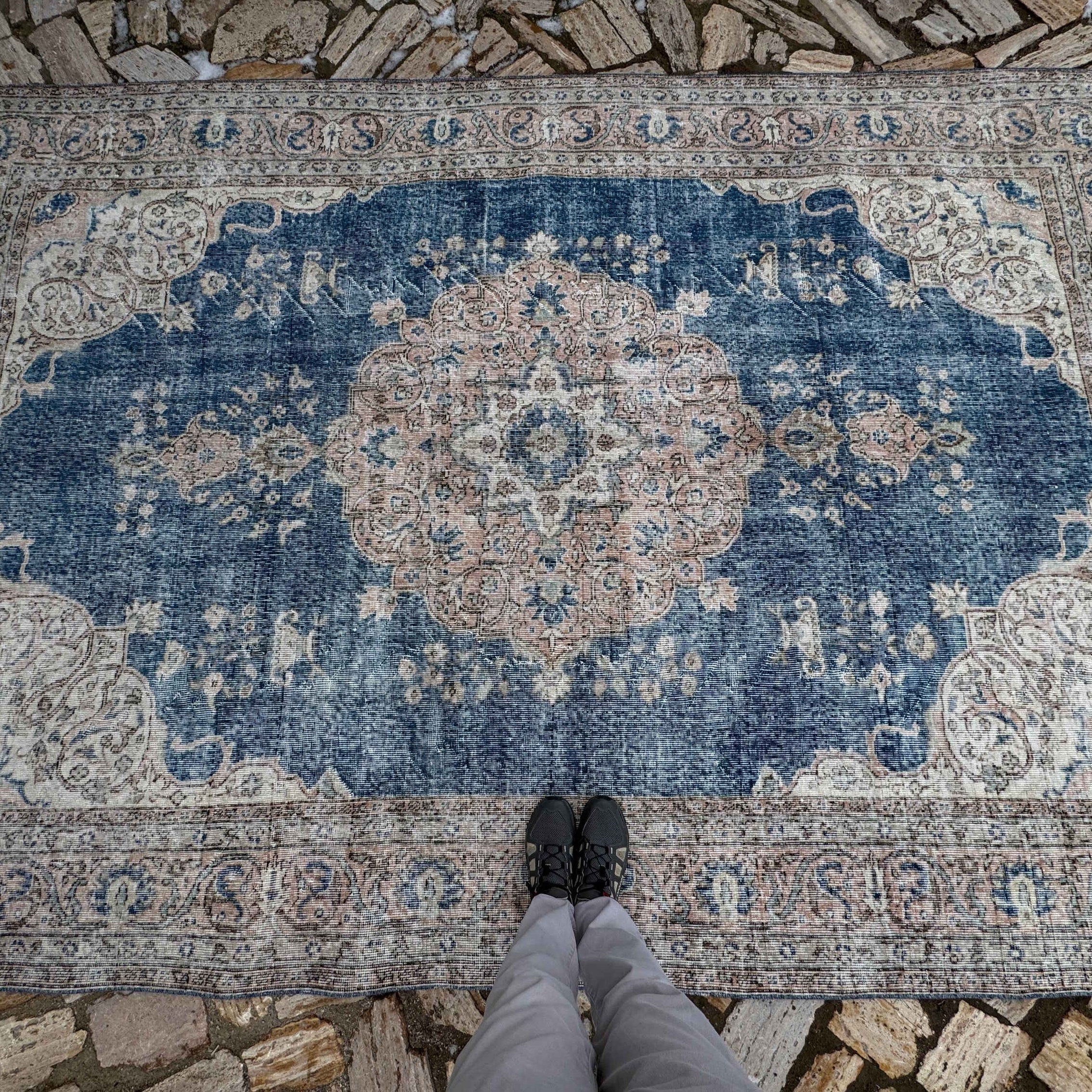 1970s blue vintage Turkish medallion carpet with medallion design, hand-knotted weave and low pile.
