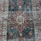 1970s blue vintage Turkish medallion rug with traditional design, hand-knotted weave and low pile.