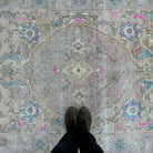 1970s pink vintage Turkish medallion rug with neutral design, hand-knotted weave and low pile.