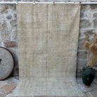 Beige 5' x 9' vintage medallion rug with neutral design, handmade in Turkey – Arnav.