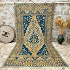 Blue 6' x 12' vintage medallion rug with geometric design, handmade in Turkey – Fabian.