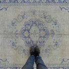 1970s blue vintage Turkish medallion rug with neutral design, hand-knotted weave and low pile.