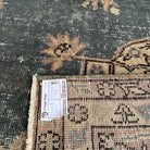 1970s blue vintage Turkish medallion rug with medallion design, hand-knotted weave and low pile.