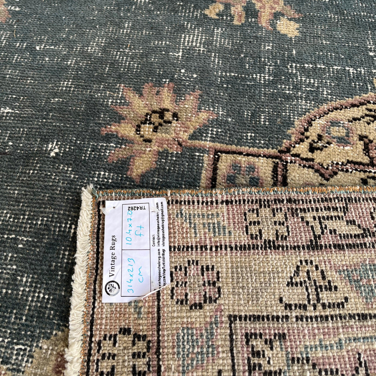 1970s blue vintage Turkish medallion rug with medallion design, hand-knotted weave and low pile.