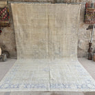 Blue 8' x 12' vintage medallion rug with neutral design, handmade in Turkey – Sincere.