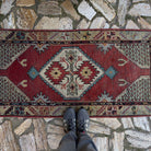 1970s red vintage Turkish medium size rug with medallion design, hand-knotted weave and low pile.