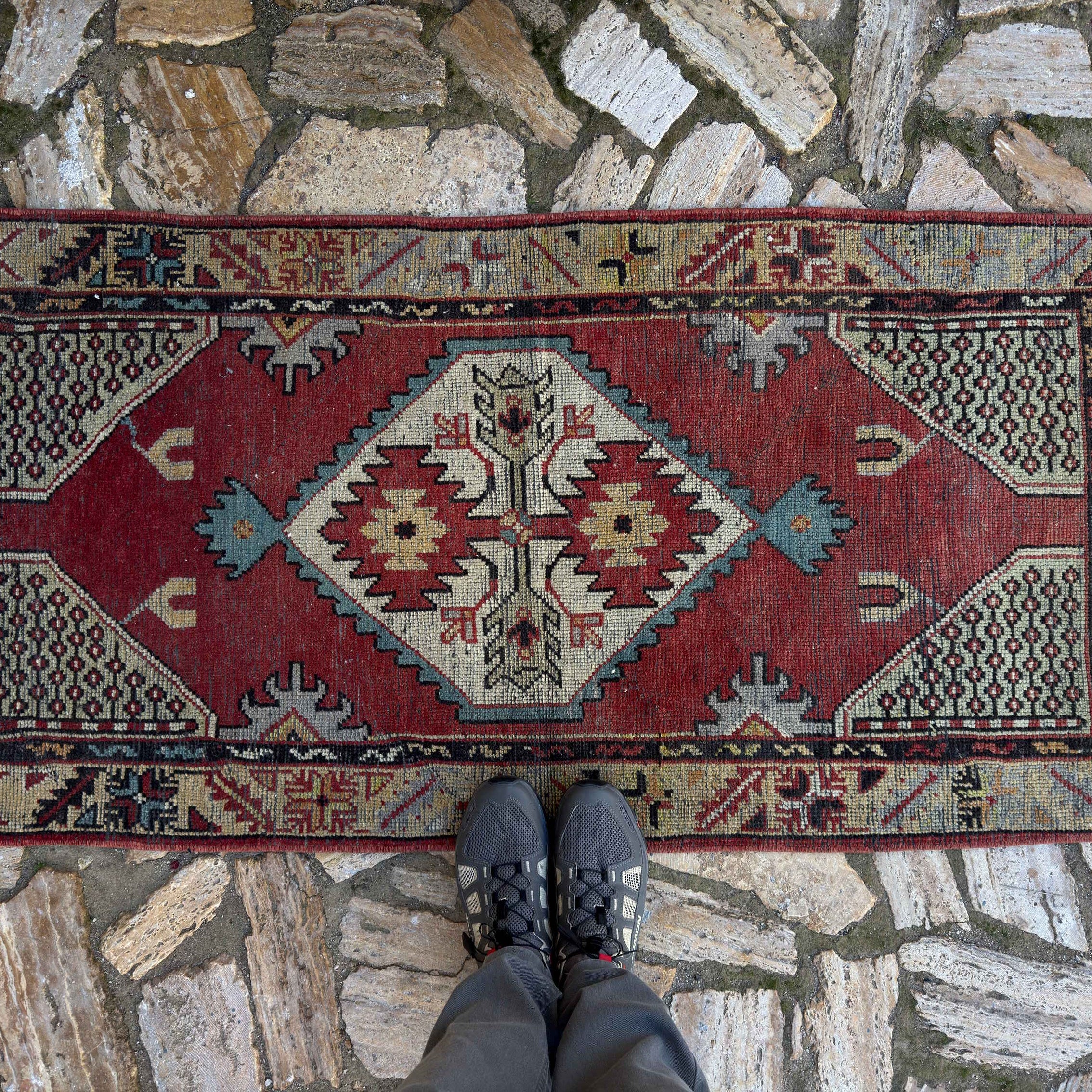 1970s red vintage Turkish medium size rug with medallion design, hand-knotted weave and low pile.