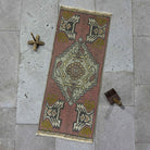 Red 1' x 3' vintage mini rug with traditional design, handmade in Turkey – Glyn.