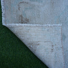 1970s beige vintage Turkish neutral rug with neutral design, hand-knotted weave and low pile.