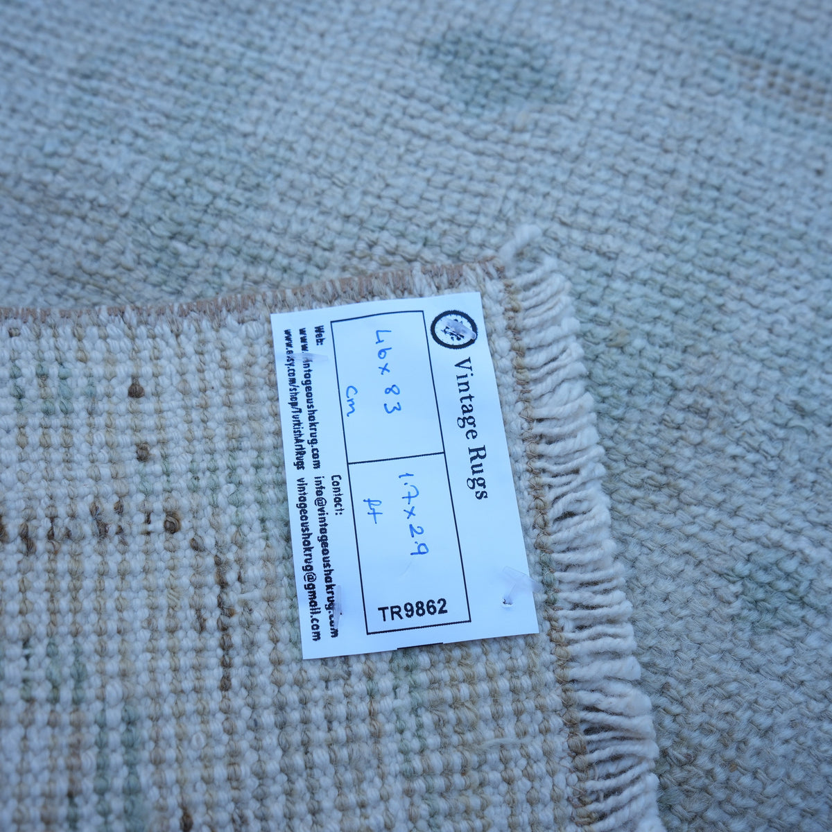 Beige 2' x 3' vintage Turkish neutral rug from the 1970s with neutral design.