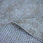 Additional view of the pink vintage Turkish neutral rug, hand-knotted in wool and cotton.