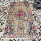 Blue 4' x 7' vintage Turkish oriental rug in wool and cotton, shown on the floor.