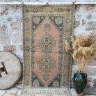 Pink 4' x 7' vintage oriental rug with geometric design, handmade in Turkey – Luisa.