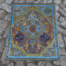 Blue 3' x 4' vintage Turkish oushak rug in wool and cotton, shown on the floor.