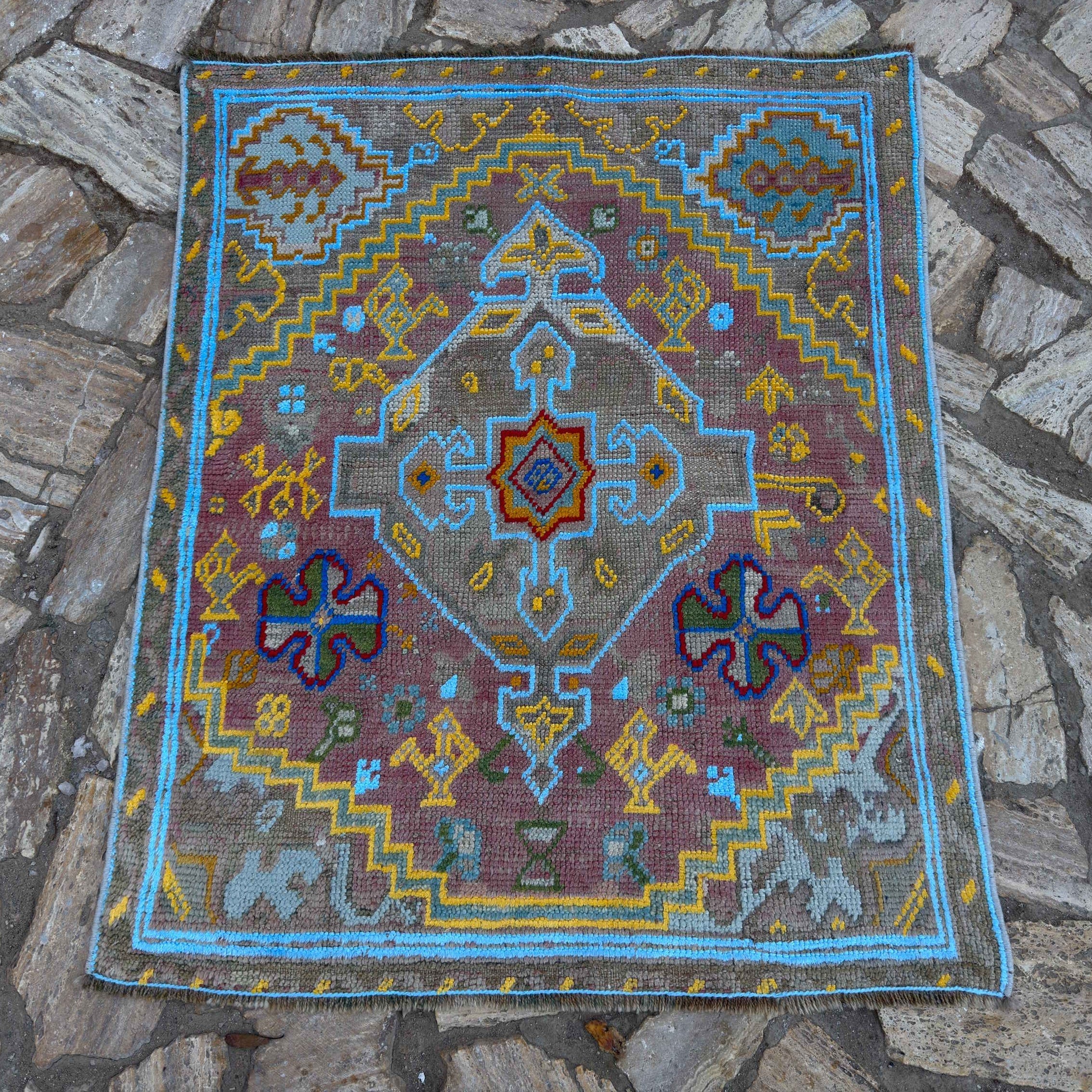 Blue 3' x 4' vintage Turkish oushak rug in wool and cotton, shown on the floor.