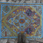 1970s blue vintage Turkish oushak rug with traditional design, hand-knotted weave and low pile.
