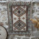 Brown 4' x 5' vintage oushak rug with medallion design, handmade in Turkey – Ciara.