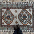 1970s brown vintage Turkish oushak rug with medallion design, hand-knotted weave and low pile.