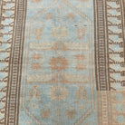 1970s blue vintage Turkish oushak rug with traditional design, hand-knotted weave and low pile.