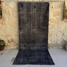 Black 4' x 10' vintage overdyed rug with overdyed design, handmade in Turkey – Nia.