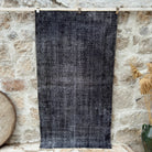 Black 4' x 7' vintage overdyed rug, handmade in Turkey – Cedric.