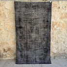 Black 4' x 7' vintage overdyed rug with overdyed design, handmade in Turkey – Loyal.