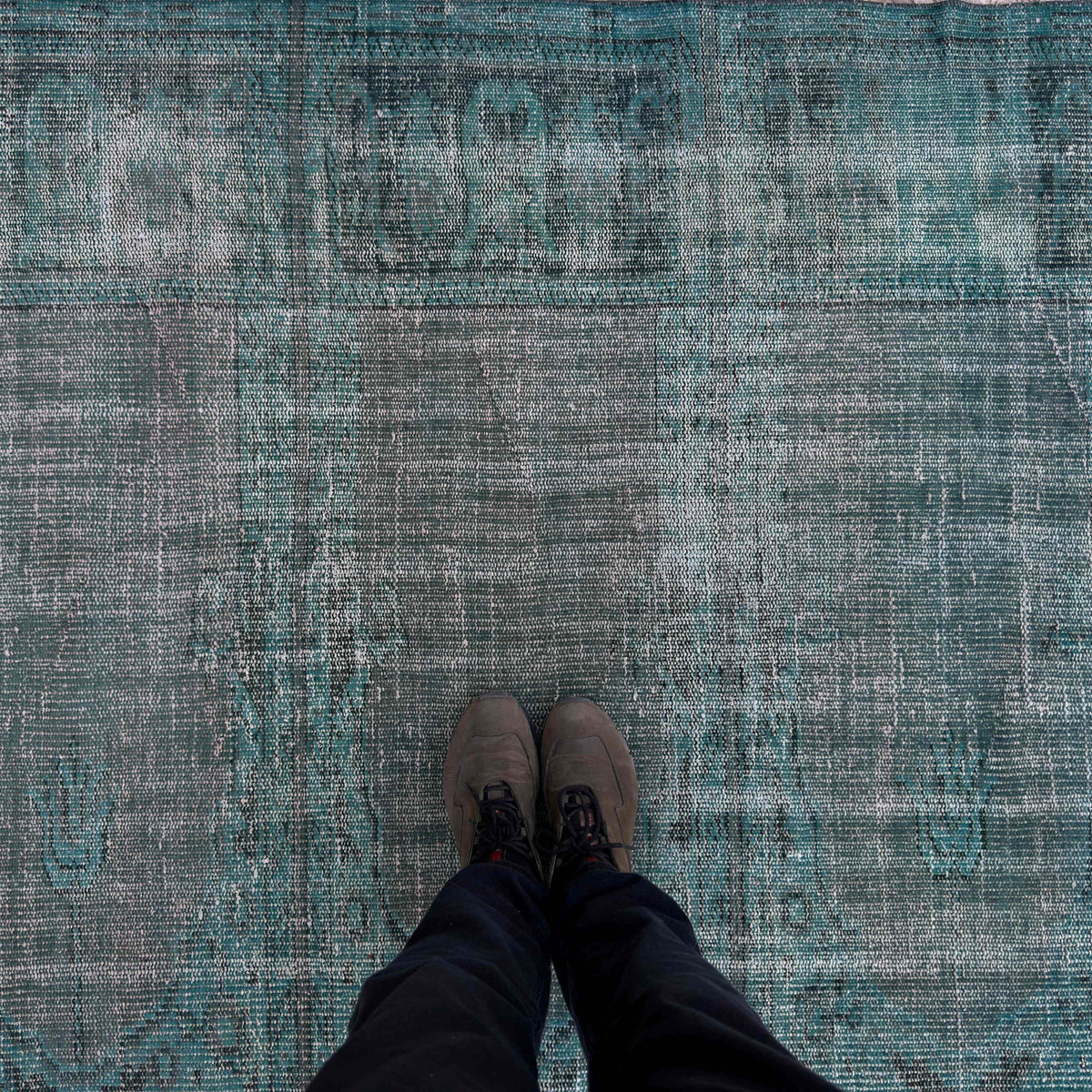 1970s blue vintage Turkish overdyed rug with overdyed design, hand-knotted weave and low pile.