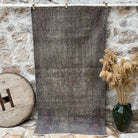 Gray 4' x 7' vintage overdyed rug with overdyed design, handmade in Turkey – Declan.