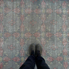 1970s gray vintage Turkish overdyed rug with traditional design, hand-knotted weave and low pile.