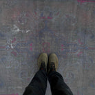 1970s grey vintage Turkish overdyed rug with overdyed design, hand-knotted weave and low pile.