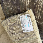 1970s gray vintage Turkish overdyed rug with overdyed design, hand-knotted weave and low pile.