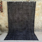 Black 6' x 9' vintage overdyed rug with overdyed design, handmade in Turkey – Rigby.