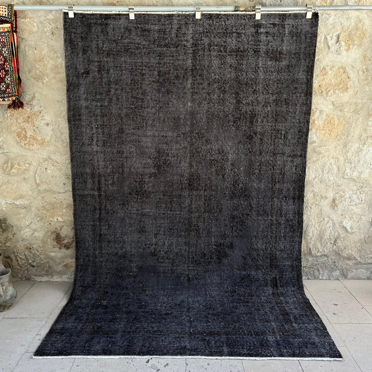 Black 6' x 9' vintage overdyed rug with overdyed design, handmade in Turkey – Rigby.