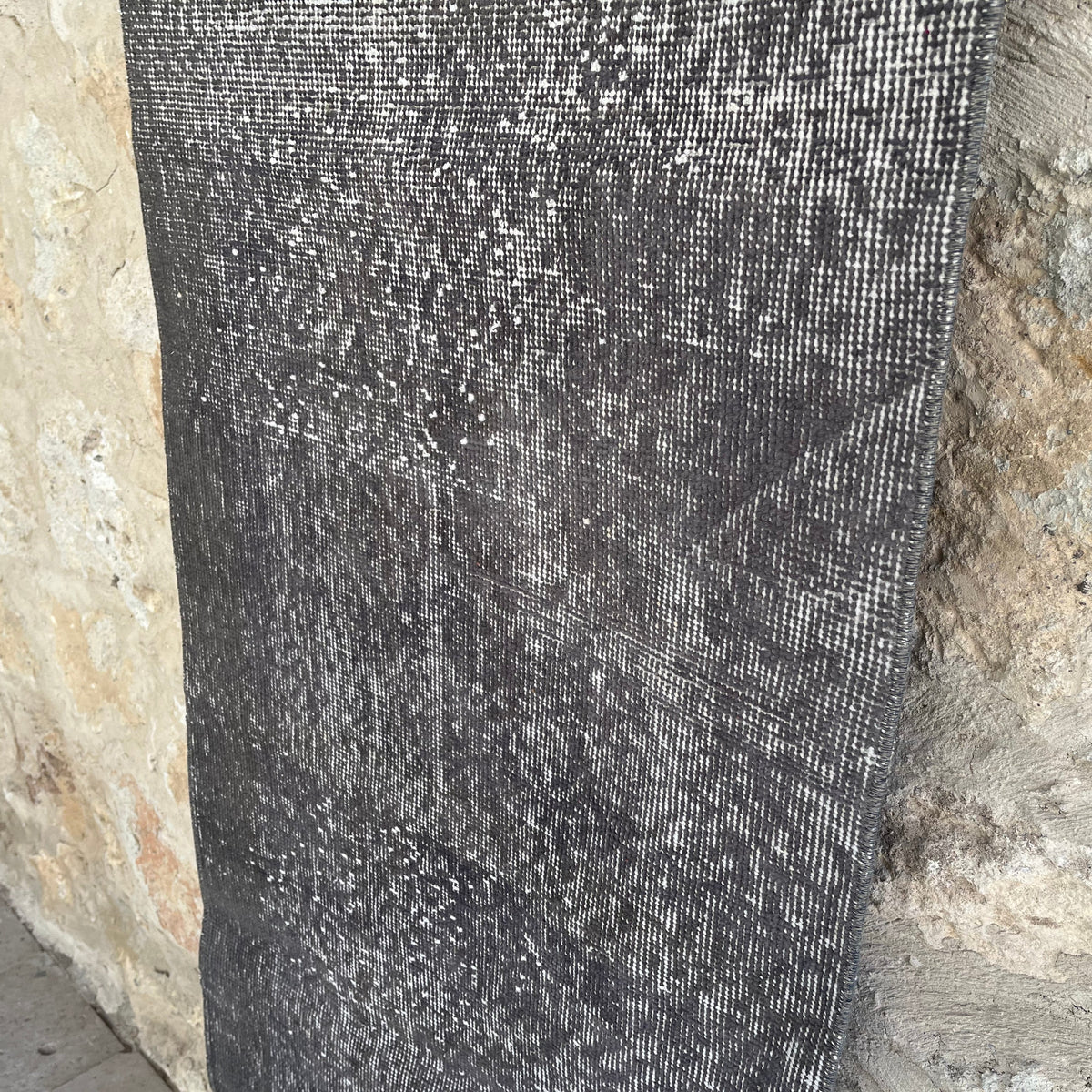 1970s gray vintage Turkish overdyed runner rug with overdyed design, hand-knotted weave and low pile.